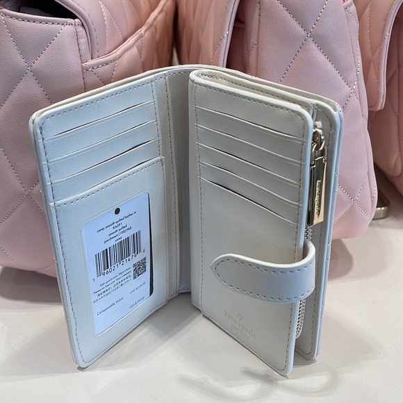 Kate Spade Carey Medium Compartment Bifold Wallet 
COLOR: Parchment - Picture 15 of 16